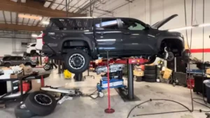 2026 Toyota Tacoma i-Force Max needs new engine after only 200 miles. (Screen Capture from WaltNasty on YouTube)