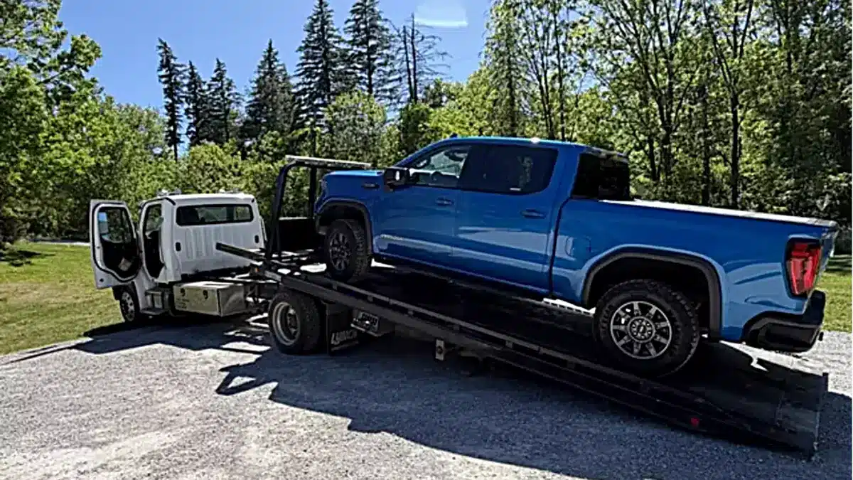 dead gm truck on tow truck
