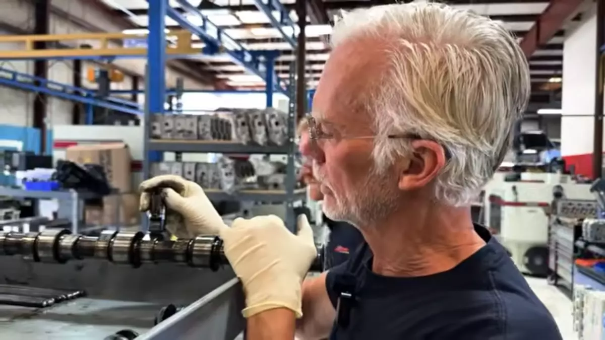 Dave demonstrates the roller problem in the new-generation Cummins 6.7. Screen capture from Daves Auto Center / YouTube