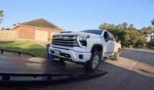 towtruck dustin youtube screen cap of brand new silverado hd being loaded doa