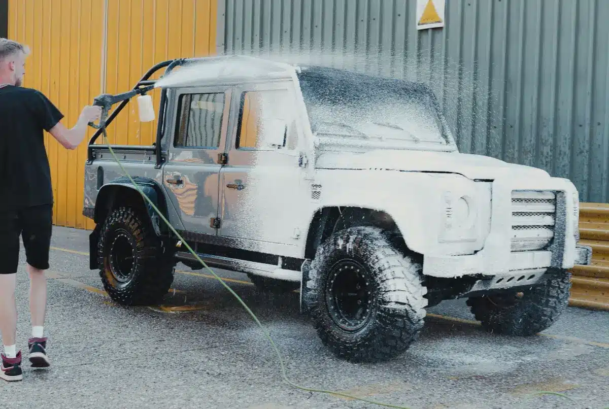 A truck getting a foam bath. Image courtesy of Pexels.