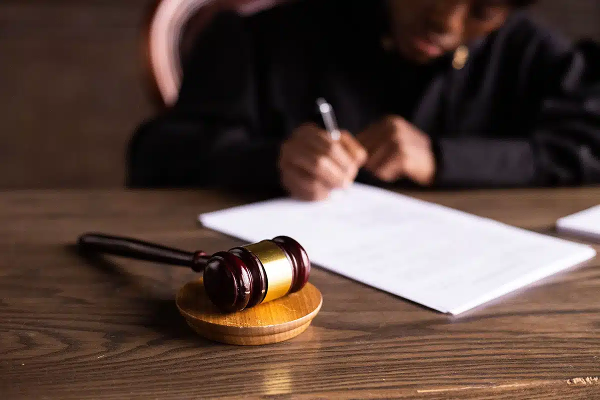 Gavel resting beside legal documents