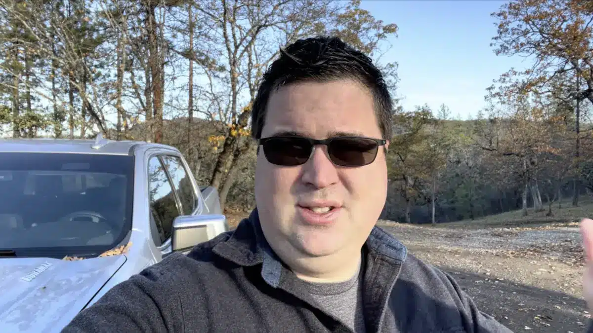 Chevrolet Silverado 3.0L Duramax owner delivering his long-term verdict beside the truck