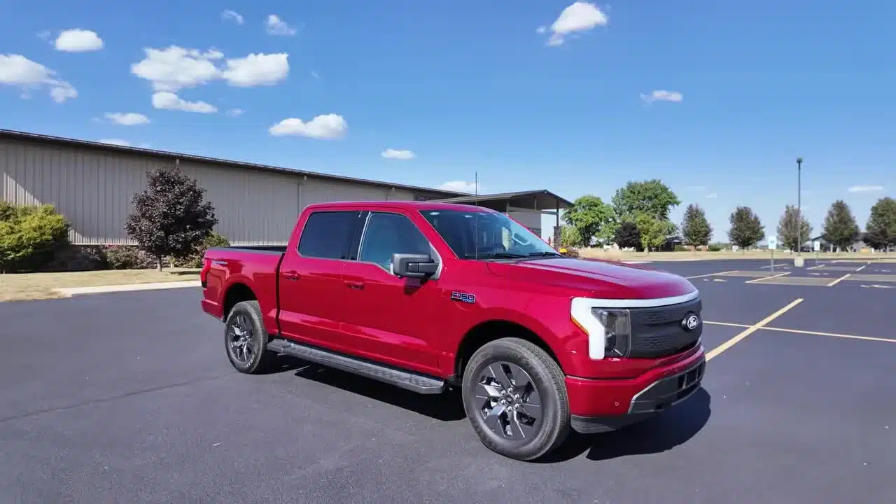 Red 2025 Ford F-150 Lightning Flash parked in a lot