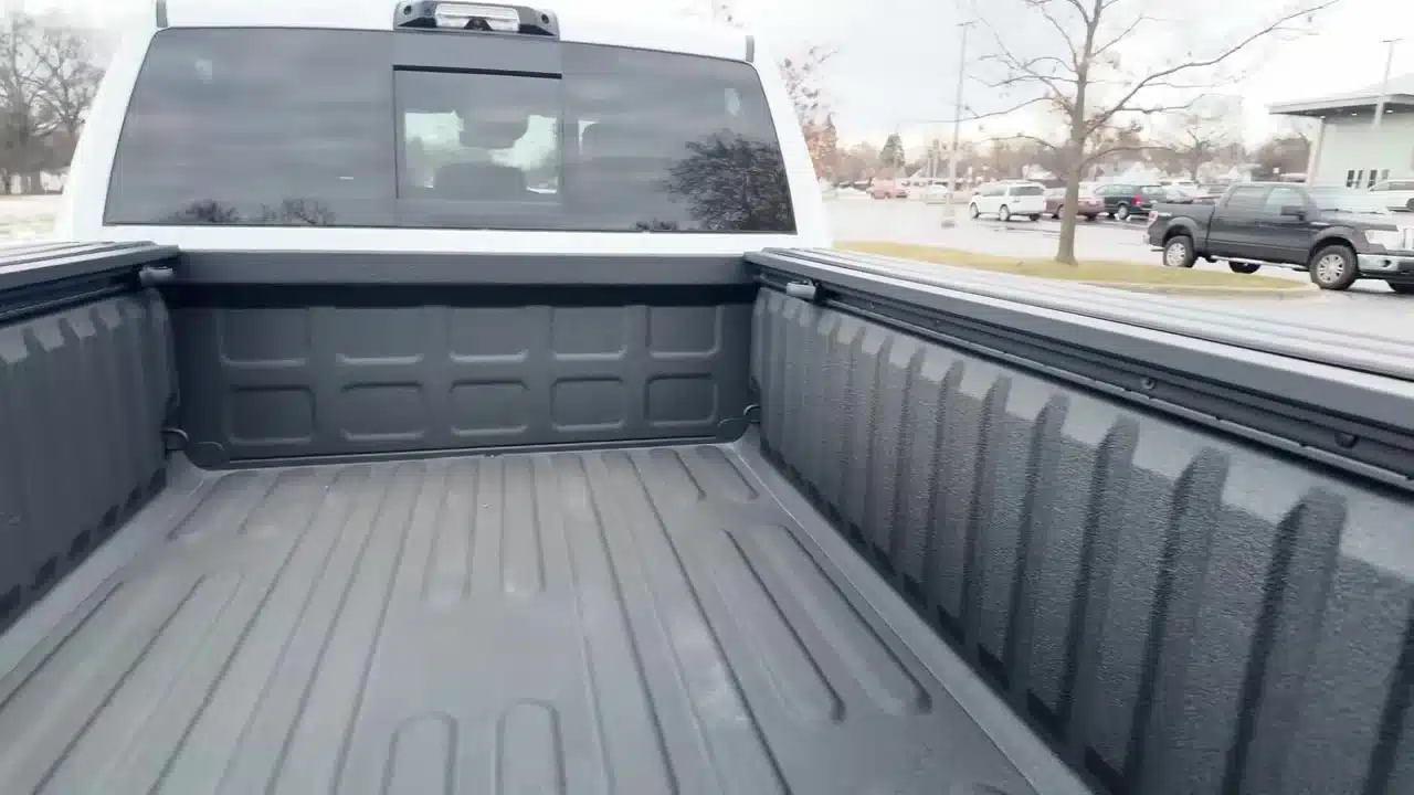 Spray-in bedliner and sliding cargo tie-down rails in the Ram Rebel bed
