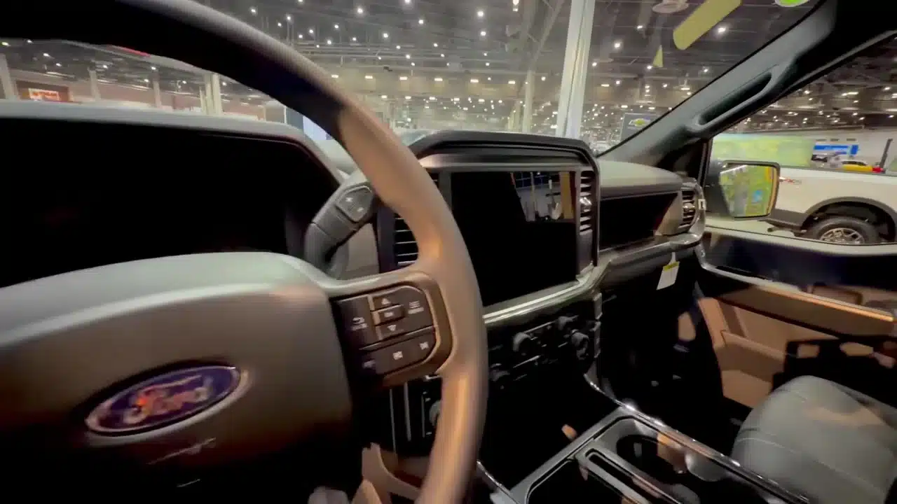 Steering wheel and dashboard inside the 2026 Ford F-150 Lobo