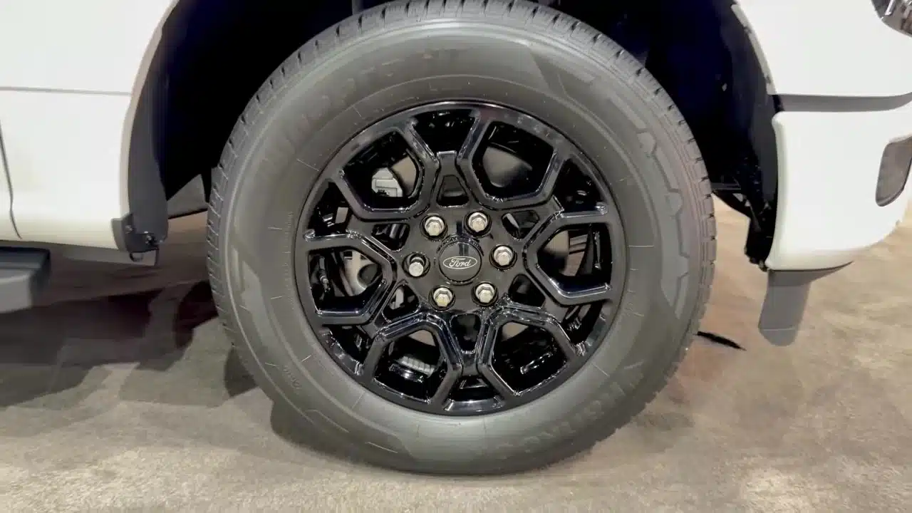 Gloss-black 18-inch wheel on the 2026 Ford F-150 XLT