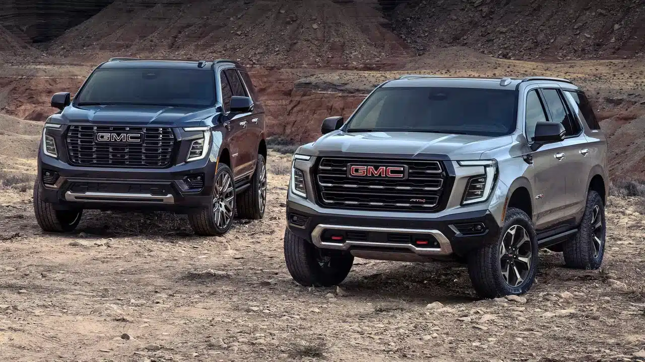2027 GMC Yukon and Yukon XL parked on rocky ground