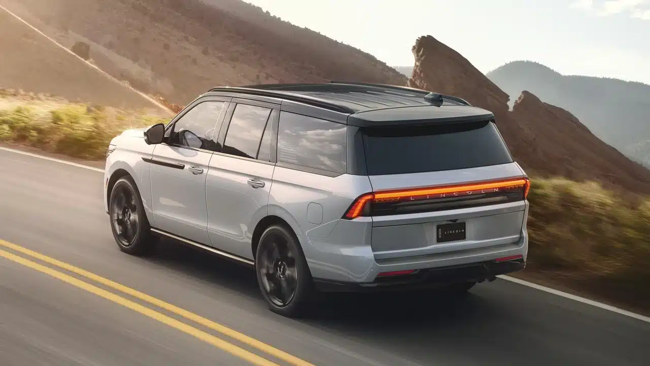 Lincoln Navigator rear view on a mountain road