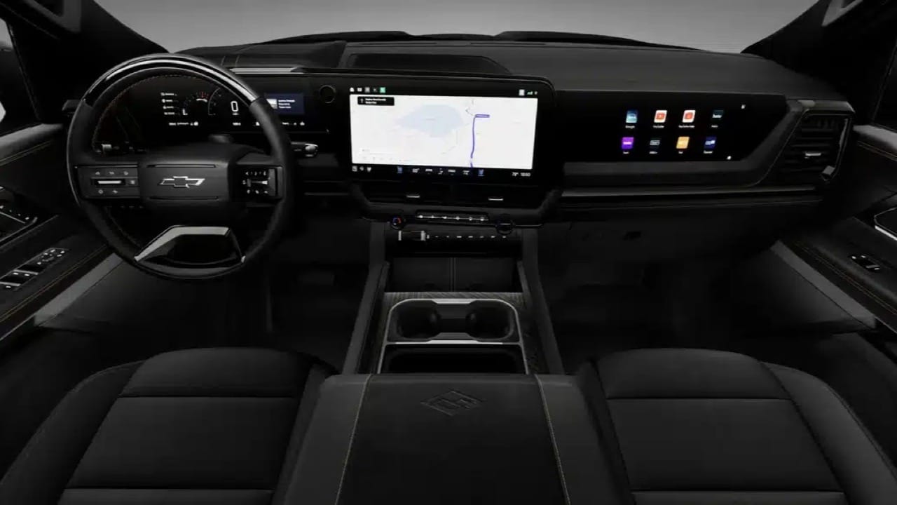 2027 Chevrolet Silverado High Country dashboard with driver, center and passenger displays