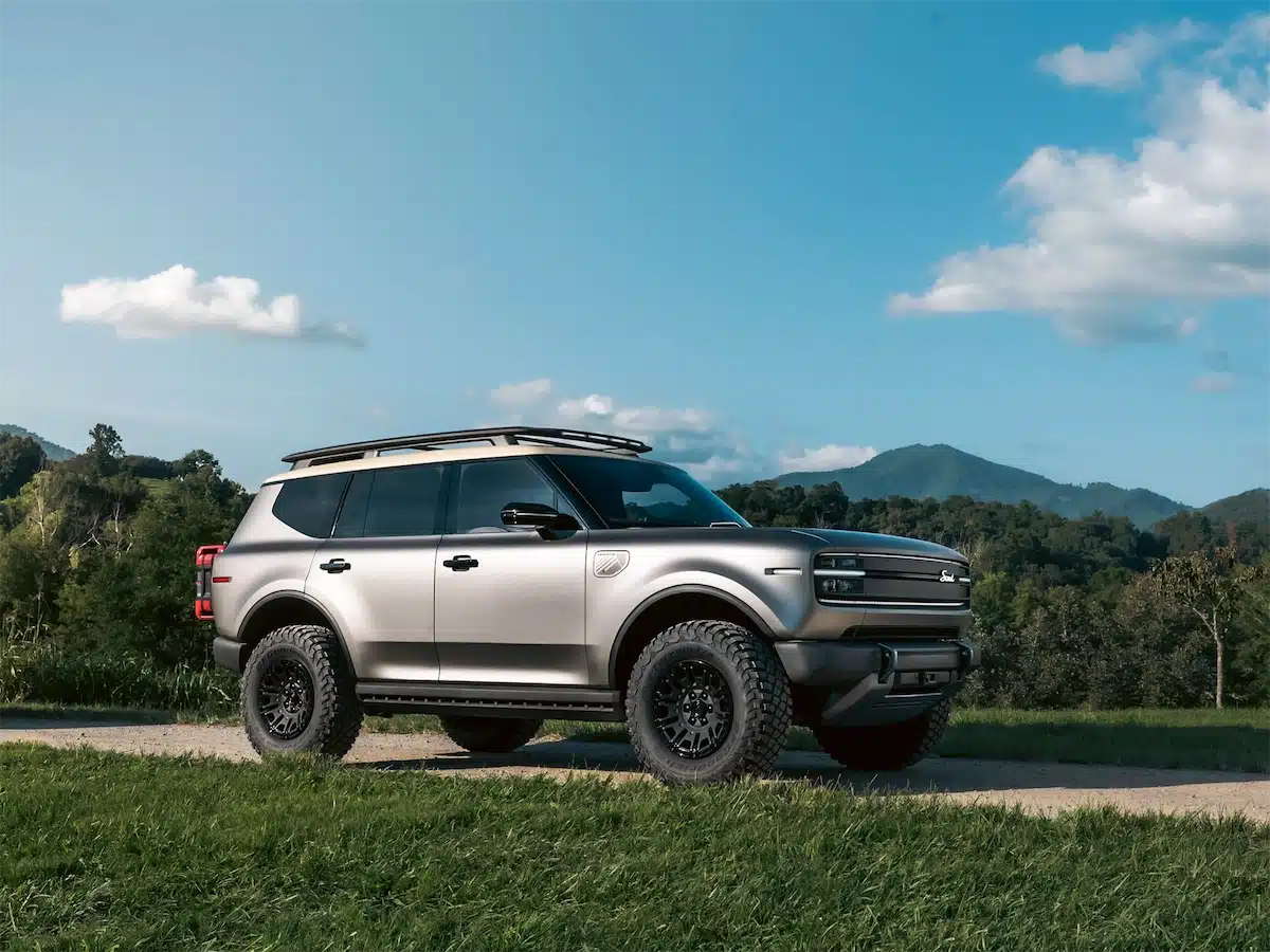 Scout Traveler Trail-Ready concept in Galvanized Steel with a Canvas roof and roof-mounted trail lights