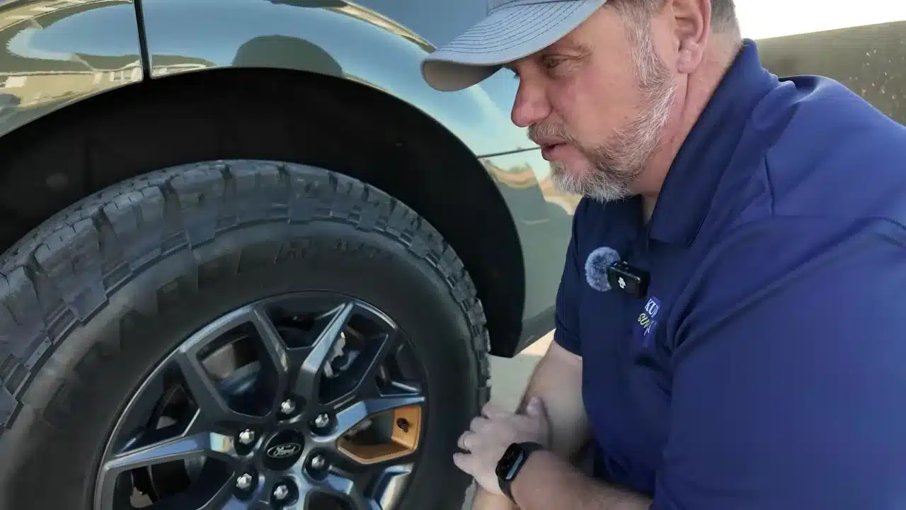 Checking rear wheel clearance after connecting weight-distributing bars