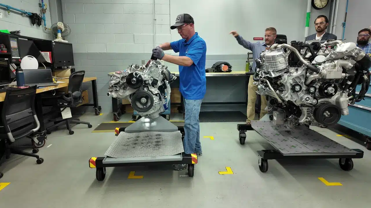 GM technician using a torque tool while Mike explains the checks