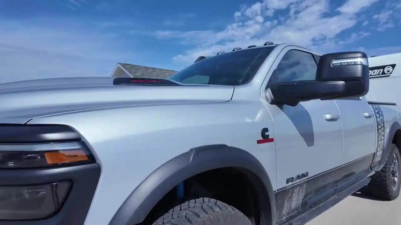 Ram Power Wagon with Cummins badge and camper