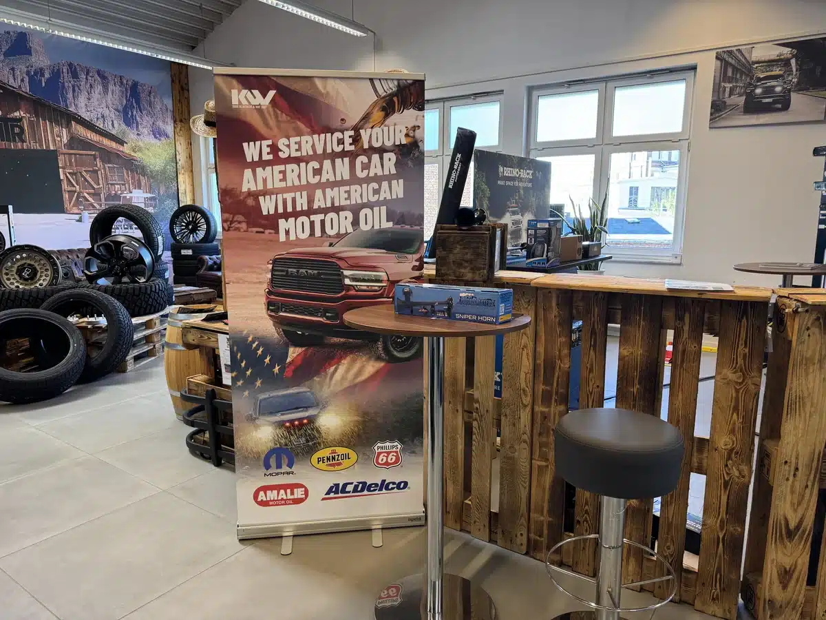 Showroom counter with an American motor oil display.