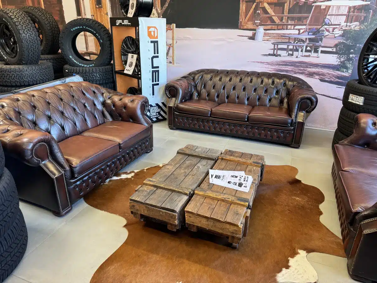 Leather sofas and a wooden table in the Americana display.