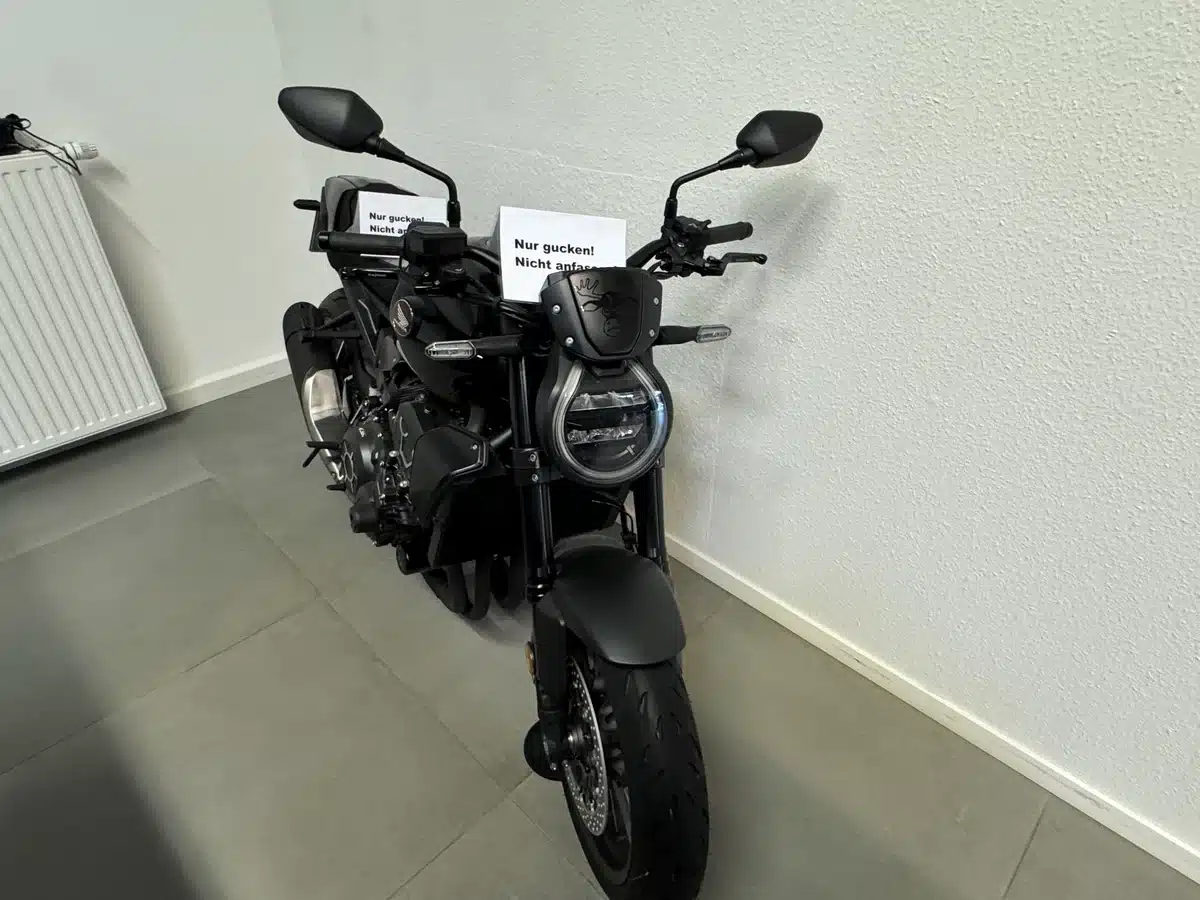 Two motorcycles displayed inside the showroom.