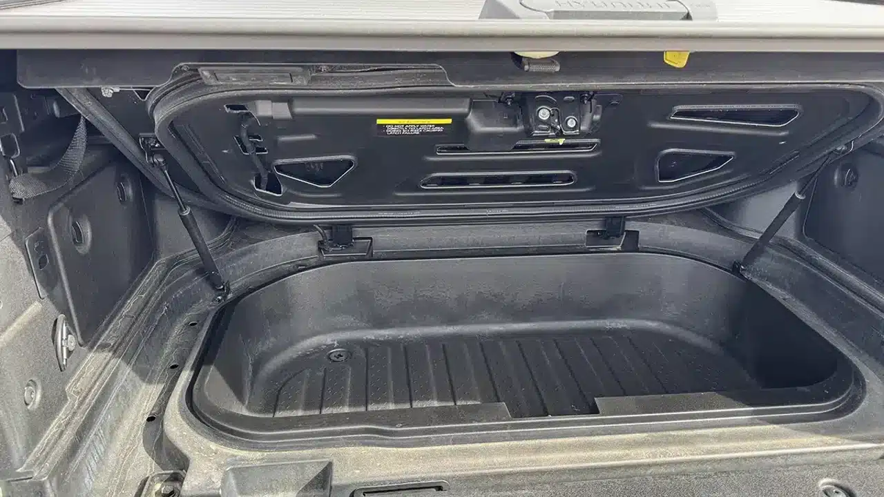 Open under-bed storage compartment in Hyundai Santa Cruz, 2026 model shown