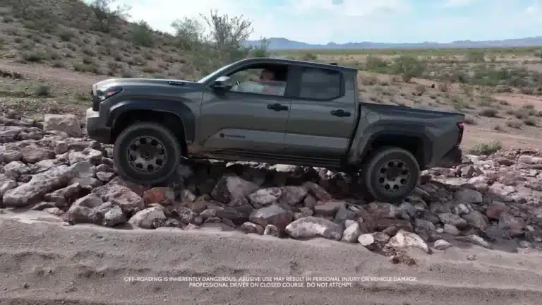 Toyota Tacoma crossing rocks at the Arizona proving ground
