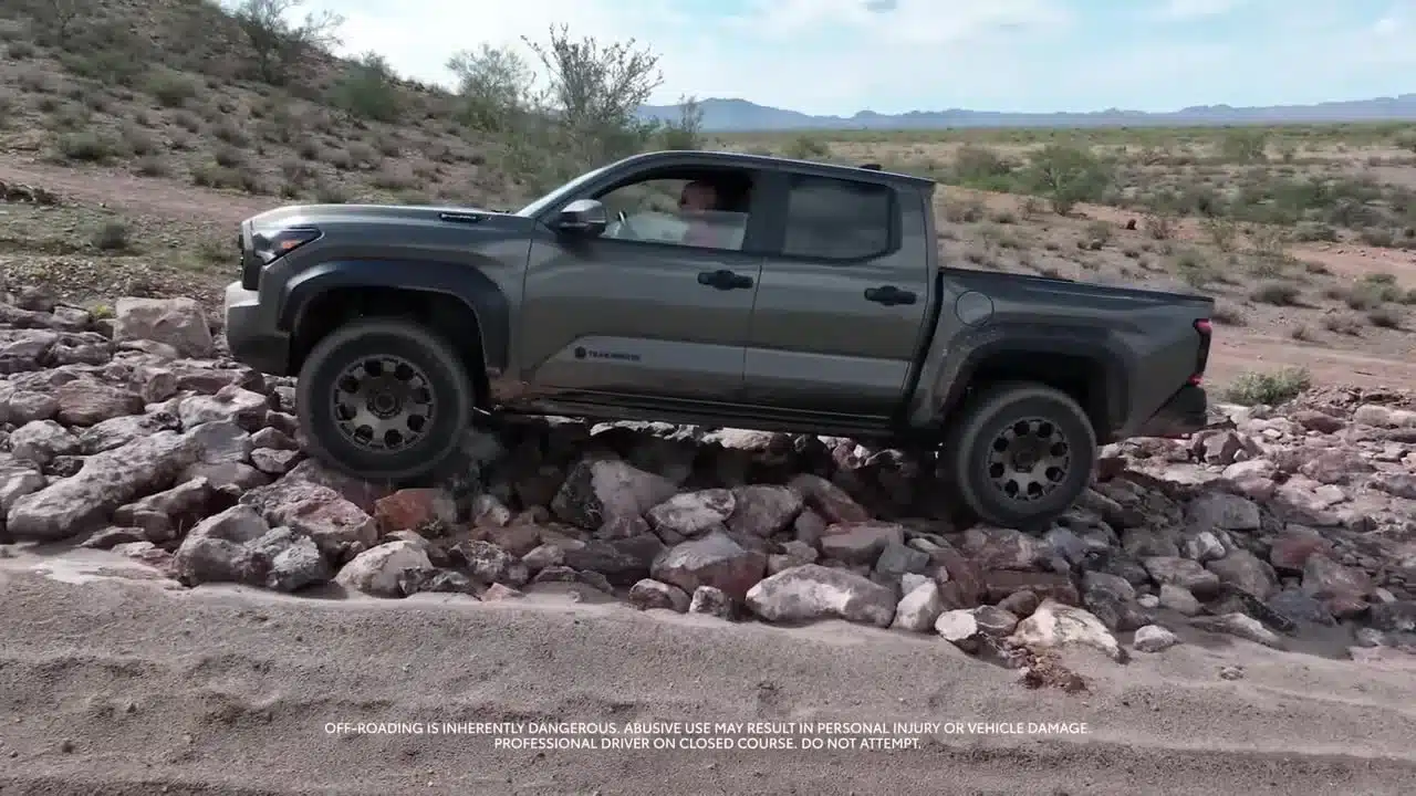 Toyota Tacoma crossing rocks at the Arizona proving ground