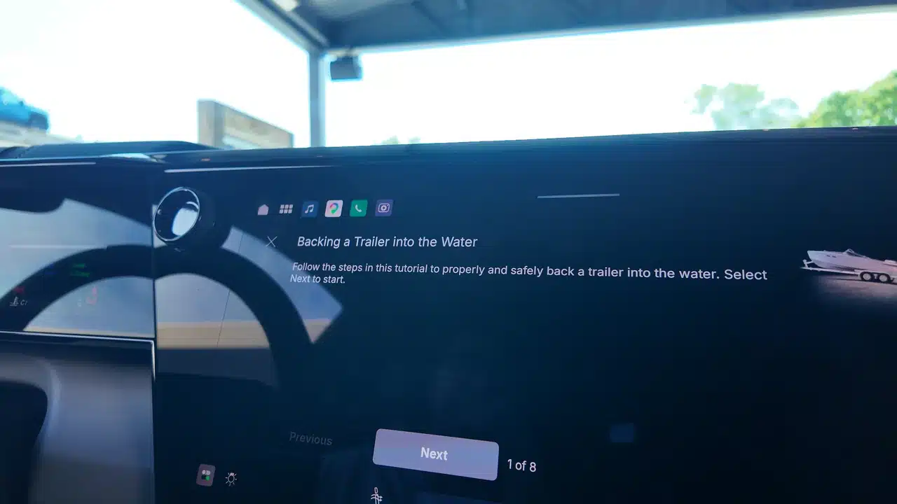 Illustrated boat-launch instructions are part of the trailering demonstration.
