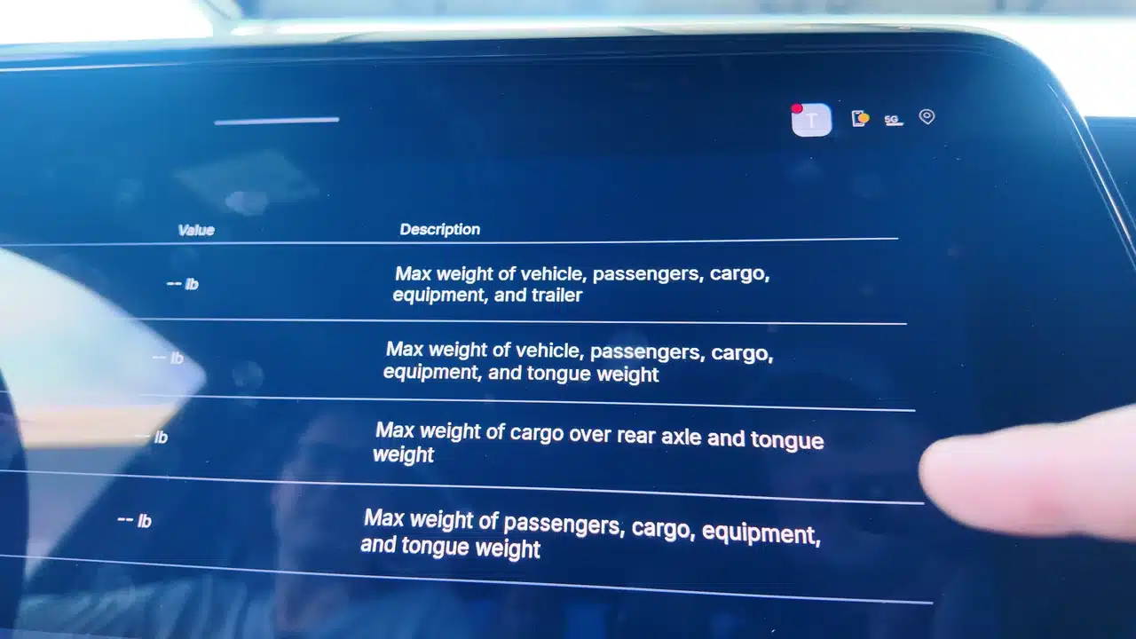 The trailering app explains vehicle weight ratings; numerical values were unavailable in demo mode.
