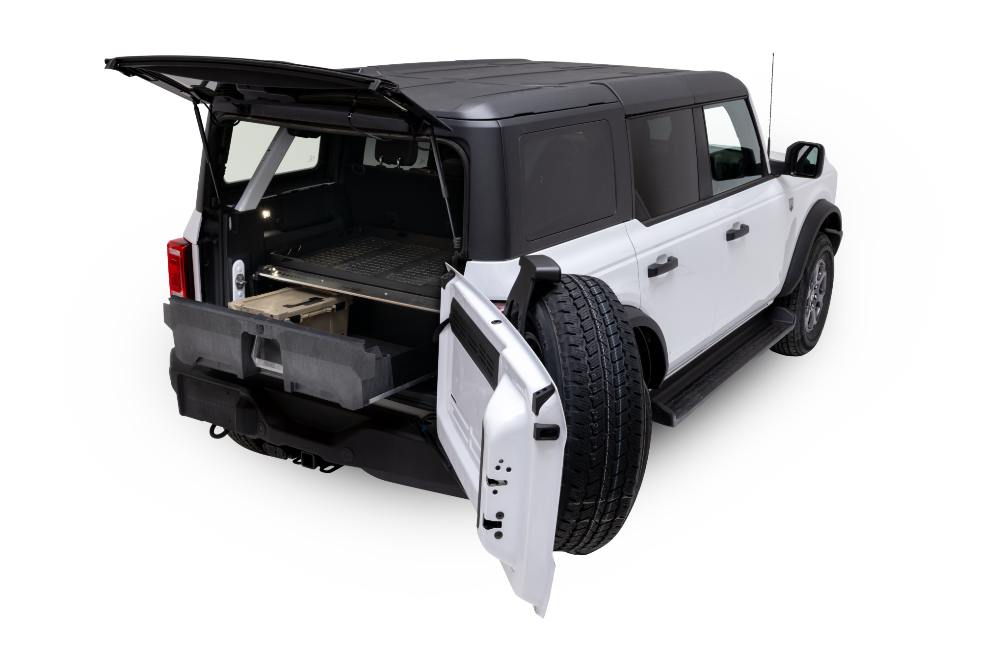 White four-door Ford Bronco with DECKED cargo drawer extended.