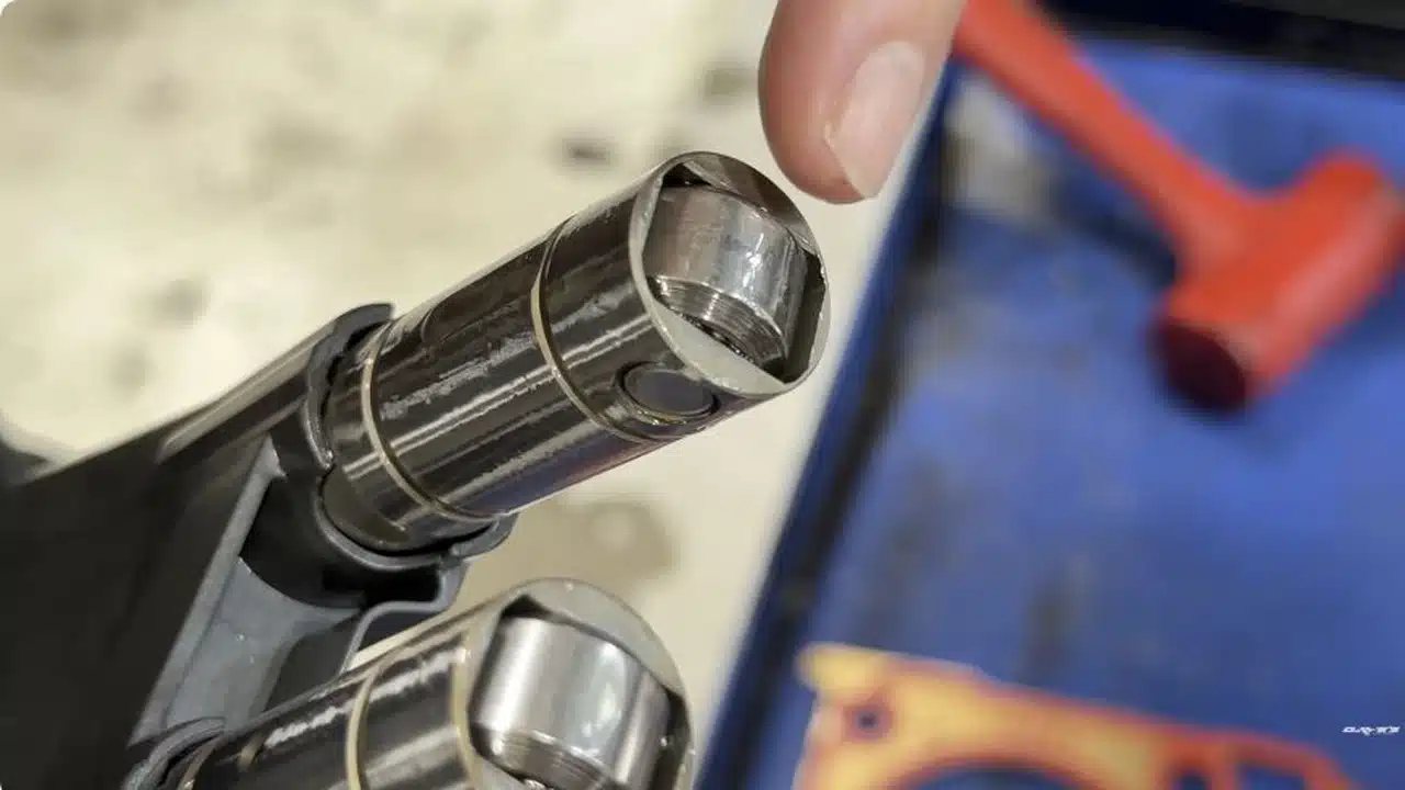 Damaged lifter shown in Dave’s Auto Center L87 teardown