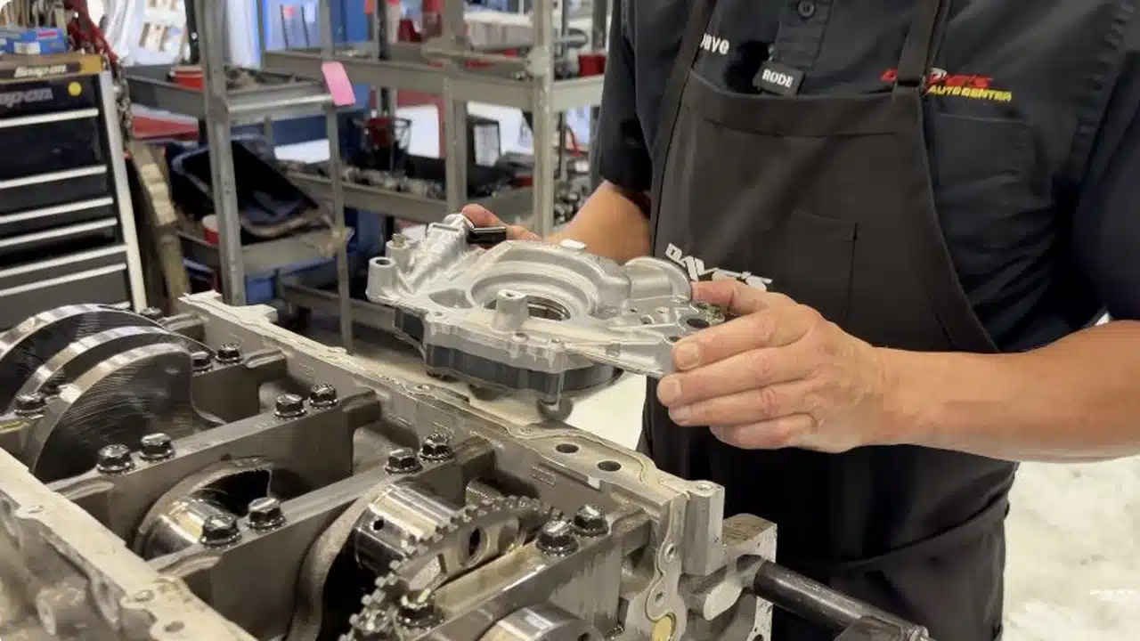 Dave holding an engine component during L87 teardown