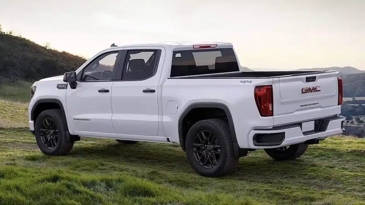 White GMC Sierra 1500 shown beside the road