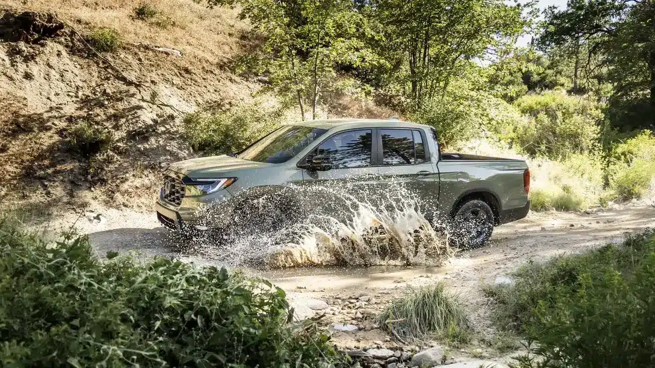 2026 Honda Ridgeline TrailSport crossing a creek