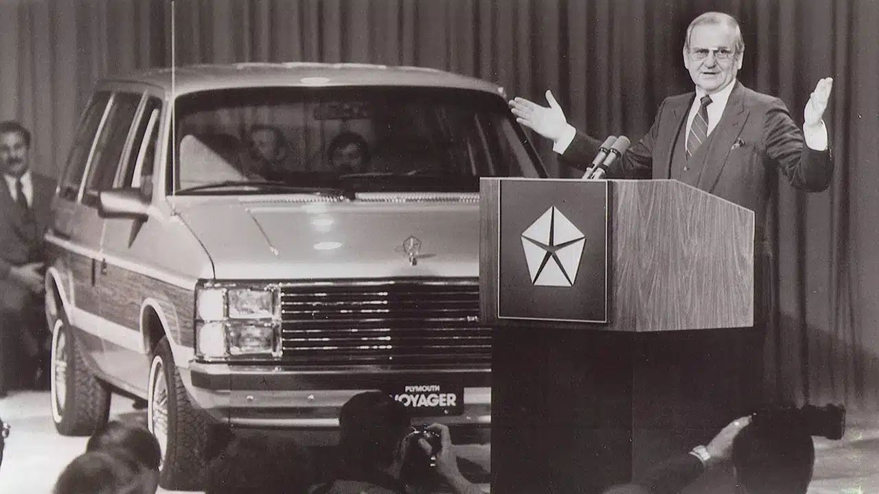 Lee Iacocca speaking at a Chrysler vehicle presentation