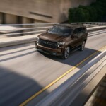 The 2023 Tahoe front three-quarter view driving. (Image courtesy of General Motors) 2023 Tahoe
