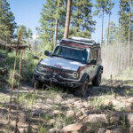 Vehicle shown subject to change based on final execution. Always consult the Owner's Manual before off-road driving, know your terrain and trail difficulty, and use appropriate safety gear. Bronco wildland firefighting