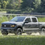 2024 Ford F-150 preproduction model shown with optional equipment. Available early 2024. Actual production vehicle may vary. Professional driver on closed course. Always consult the Owner’s Manual before off-road driving, know your terrain and trail difficult, and use appropriate safety gear. 2024 Ford F-150 STX